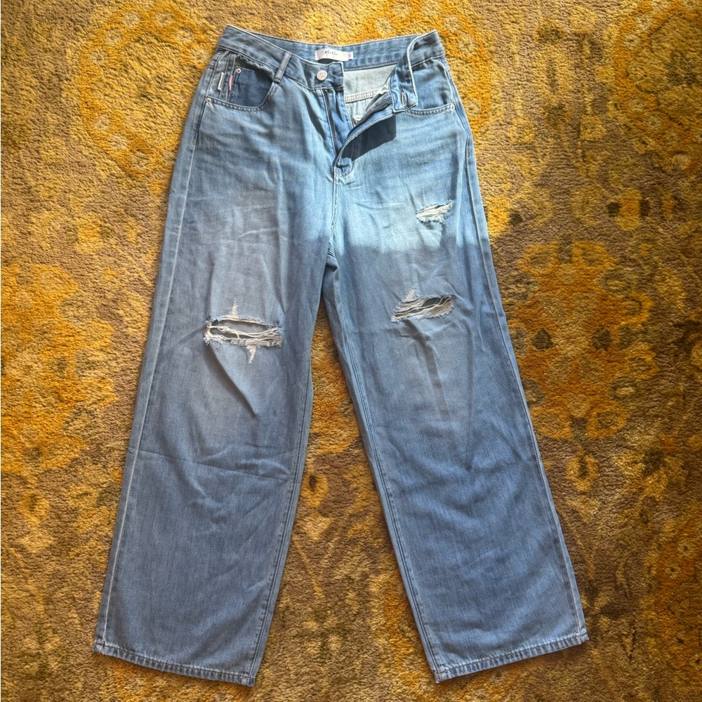 Distressed Light Blue Jeans